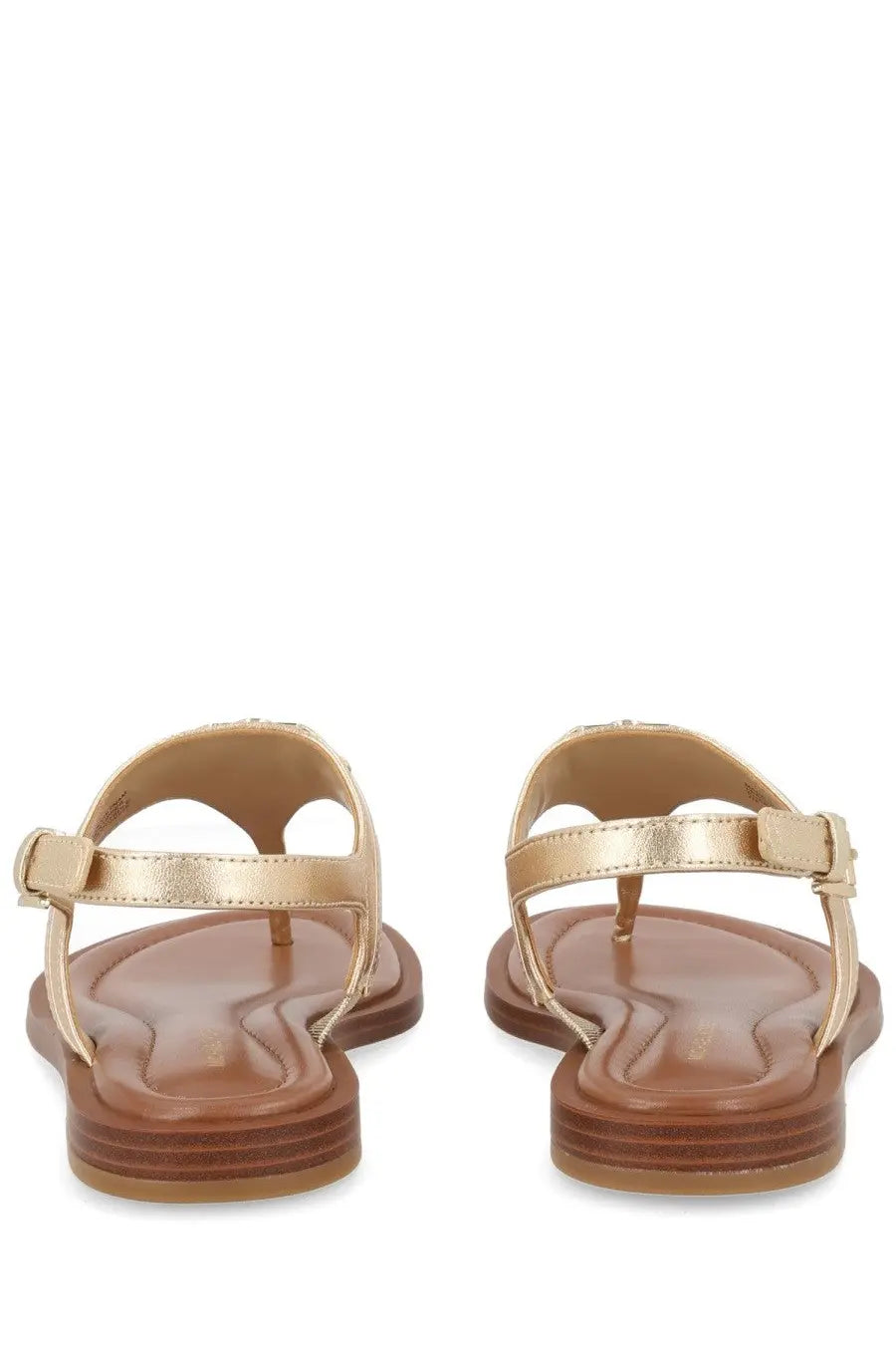 Michael Kors women’s Sandalo Mandy gold thong sandals with gold metallic strap and brown leather insole and sole
