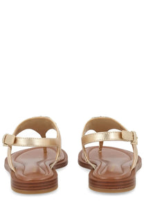Michael Kors women’s Sandalo Mandy gold thong sandals with gold metallic strap and brown leather insole and sole