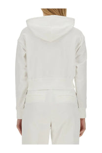 Michael kors women’s white cropped hoodie with soft textured fabric and subtle back seam detailing shown from the back