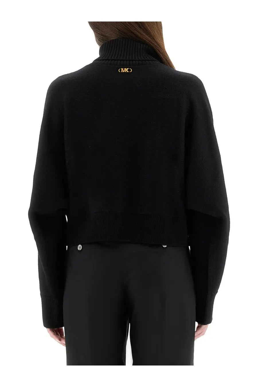 Back view of michael kors womens black wool jersey turtleneck cardigan with gold logo at the back of the neck