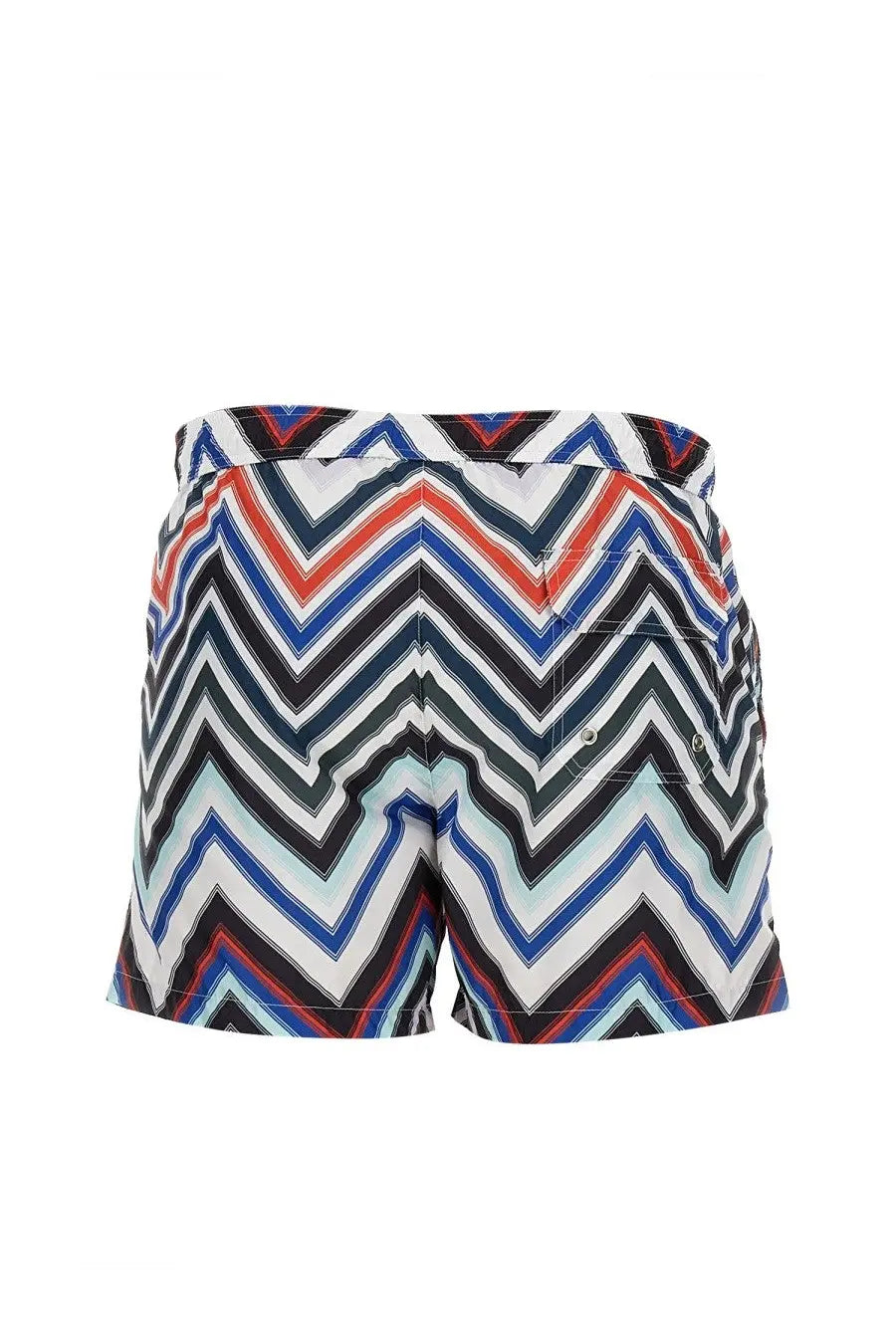 Missoni men’s swimsuit featuring vibrant zigzag-patterned swim trunks in bold red, blue, black, and white