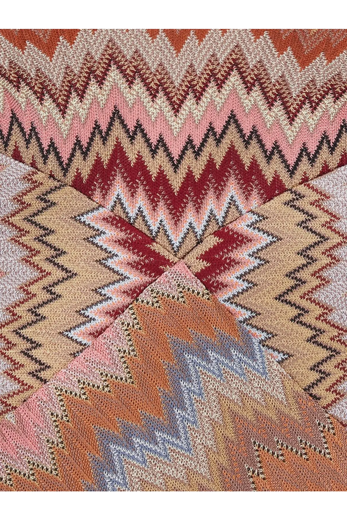 A knitted scarf with a bold zigzag pattern in pink red beige and gray complementing missoni women’s long viscose dress brown