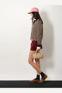 Beige leather mini handbag with top handle and front flap closure from miu miu womens arcadie leather crossbody bag collection