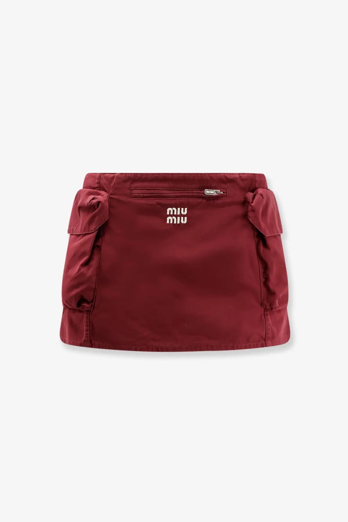 A burgundy miu miu women’s cotton mini skirt with side pockets and a front zippered pocket