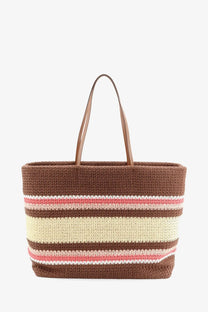 Brown and cream striped woven tote bag with pink accents and tan leather handles.
