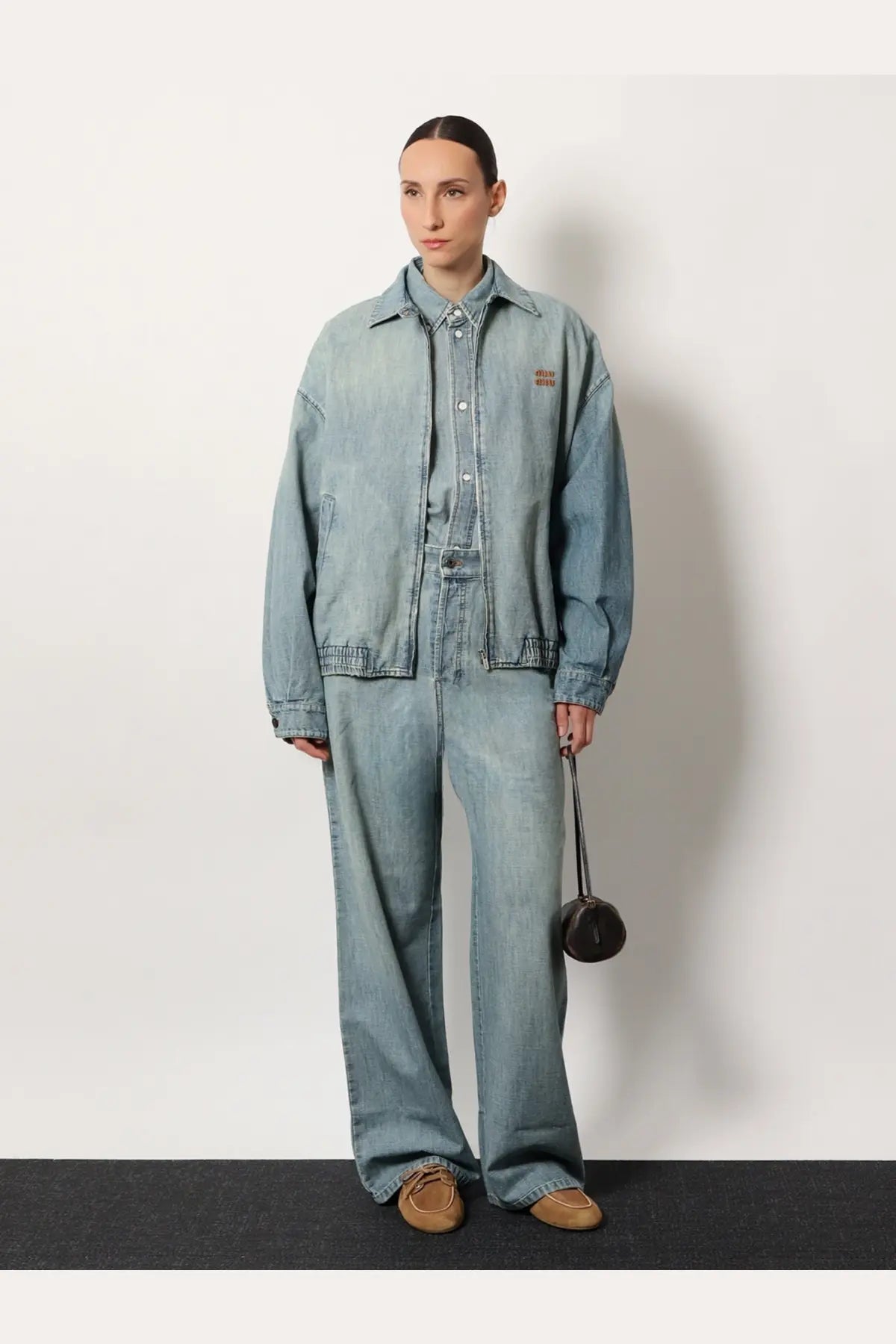 Miu miu women’s light-wash denim shirt blue with relaxed oversized fit and subtle stitching details