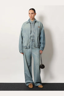 Miu miu women’s light-wash denim shirt blue with relaxed oversized fit and subtle stitching details