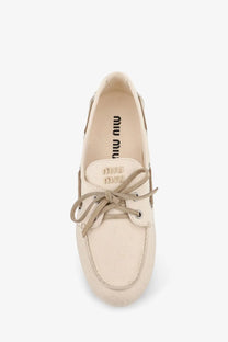 Beige miu miu women’s fabric boat shoe with matching laces and subtle stitching details in white loafers style