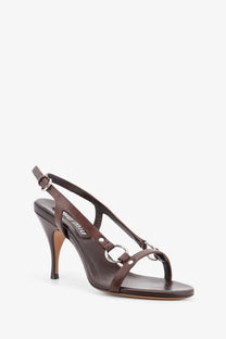 Miu miu women’s brown leather sandals with silver-toned ring details and slender heel front view