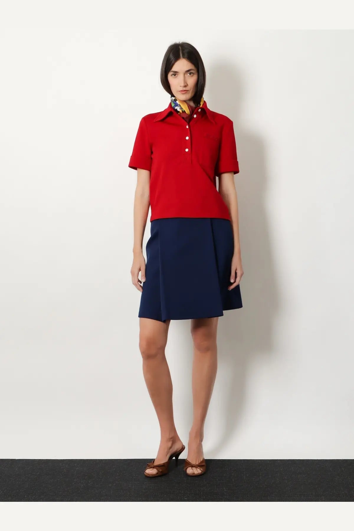 Miu Miu women’s red short-sleeved polo shirt with white buttons and colorful patterned collar in rubino shade