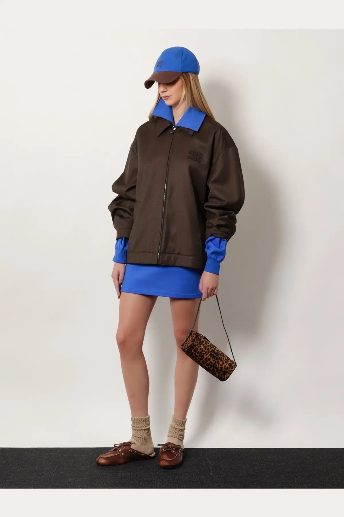 Blue and brown color-block bomber jacket with recycled material mini skirt blue by miu miu featuring contrasting collar cuffs and zipper