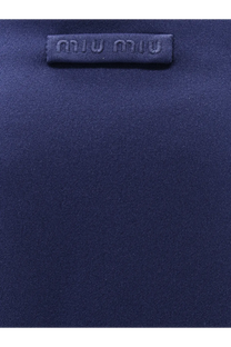 Dark blue miu miu fabric label with embossed logo on miu miu women’s skirt baltico