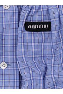 Miu Miu women’s blue and white plaid striped cotton button-up top with black woven label on pocket