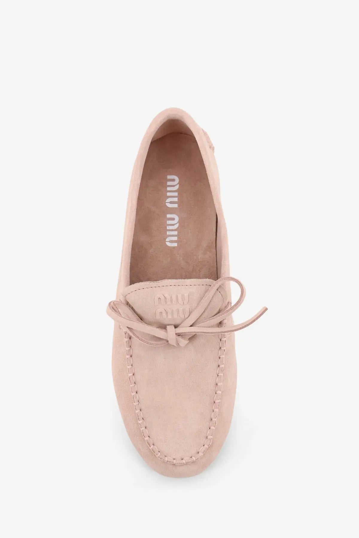 A soft blush pink suede miu miu womens loafer with tied lace detail and stitched seams pesco style