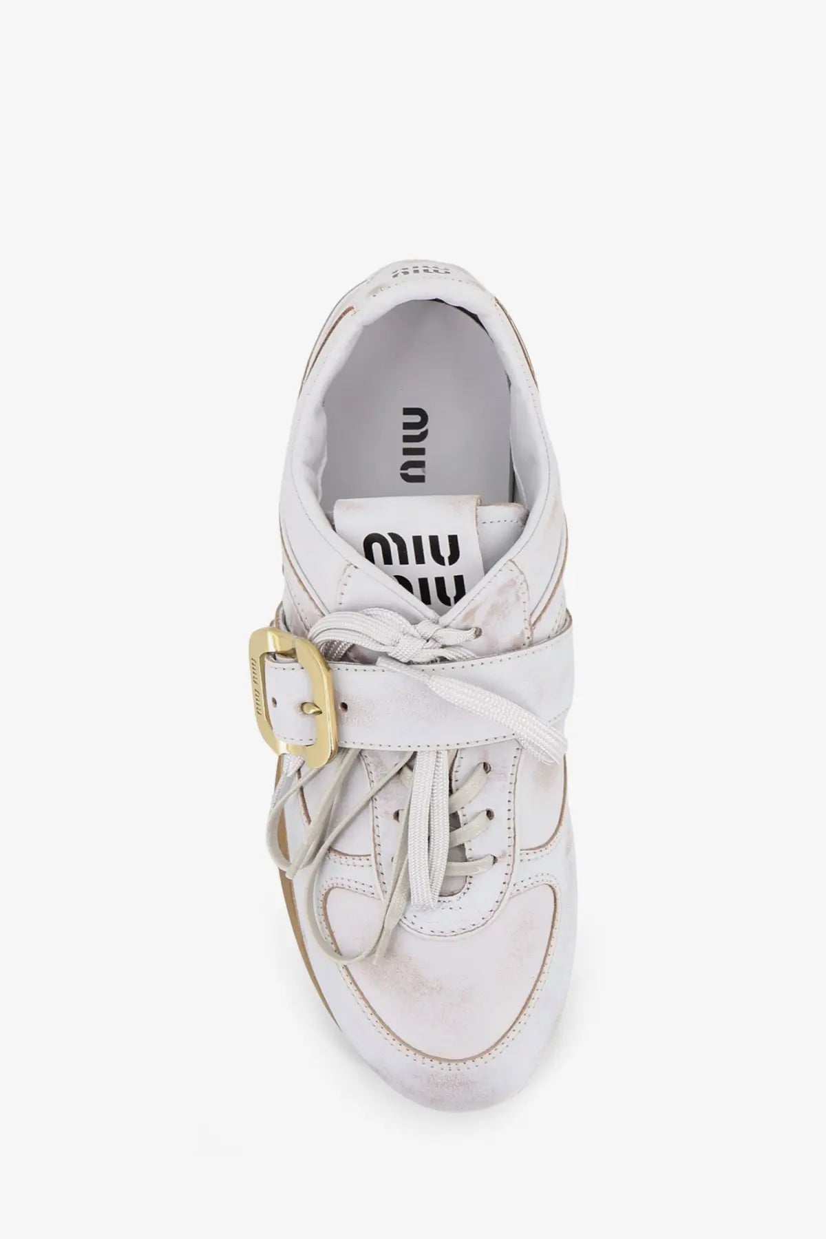 White miu miu women’s used effect leather sneaker with gold-tone buckle strap and perforated leather details