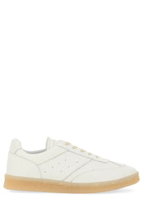 MM6 Maison Margiela men’s sneaker court white leather low-top with tan rubber sole and subtle perforated detailing