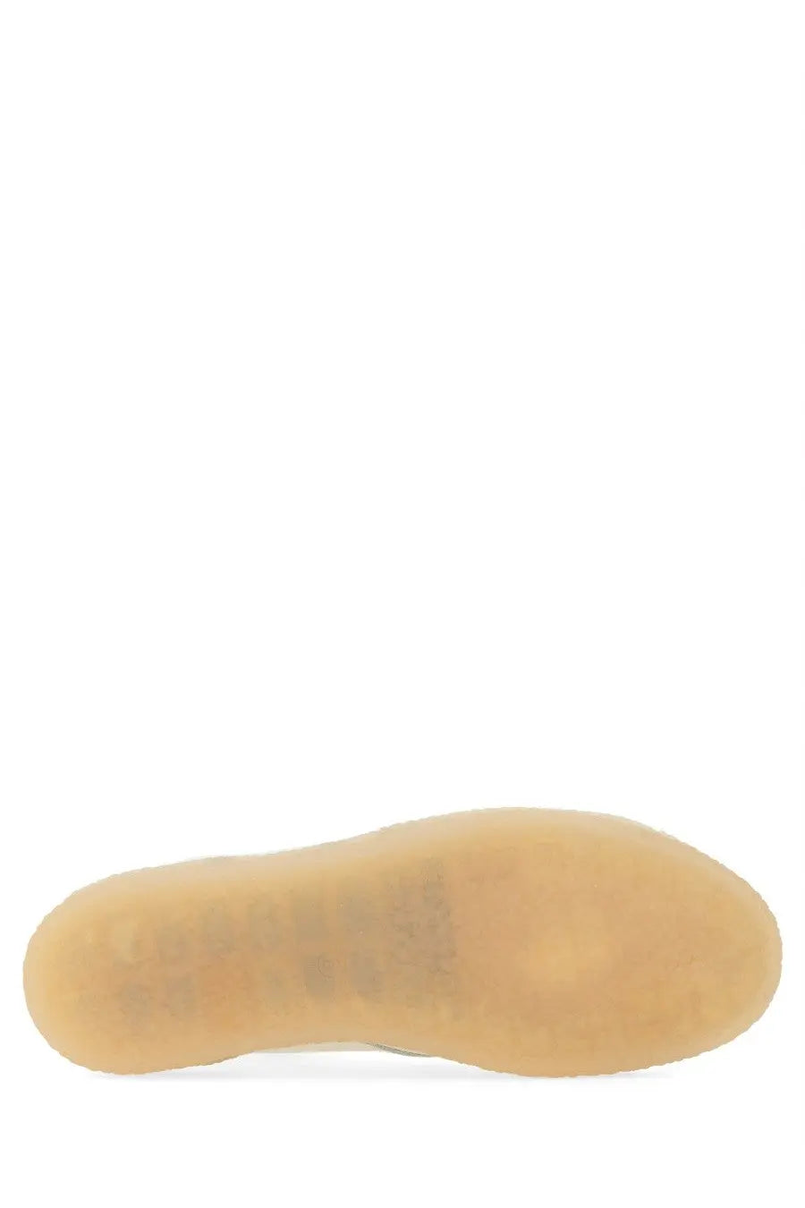 The sole of a tan rubber mm6 maison margiela men’s sneaker court white with smooth translucent finish and embossed branding