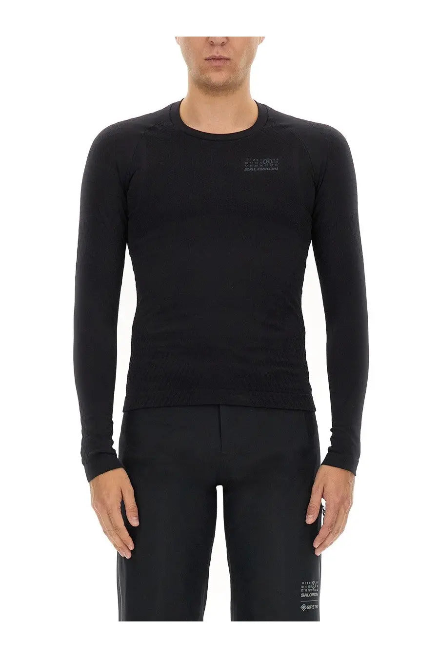 Black mm6 maison margiela men’s long-sleeved technical fabric top with subtle chest logo for performance wear