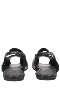Black leather mm6 maison margiela women’s anatomical slingback sandal with minimalist design and white stitching