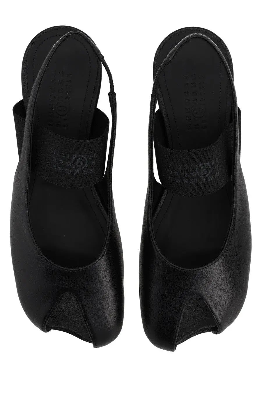 Black leather MM6 Maison Margiela women’s slingback platform pumps with distinctive toe design and branded insole
