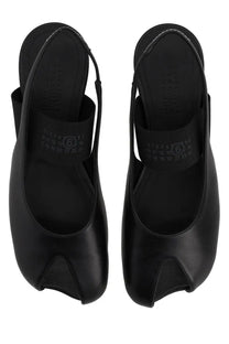 Black leather MM6 Maison Margiela women’s slingback platform pumps with distinctive toe design and branded insole