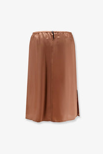 A sleek copper-toned satin midi skirt with a subtle side slit and elastic waistband by MM6 Maison Margiela