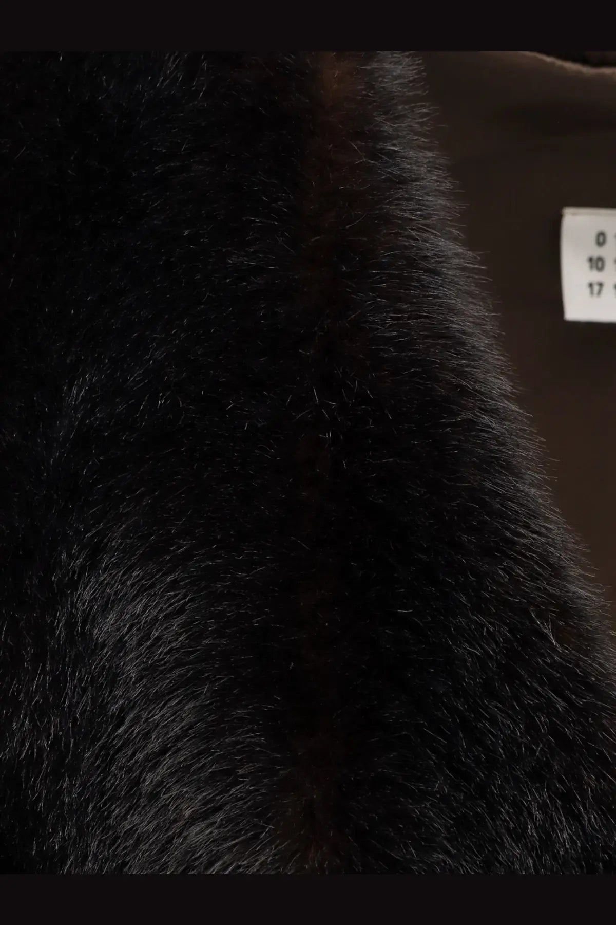 Black faux fur coat collar with dense plush texture on mm6 maison margiela women’s faux shearling short dress brown