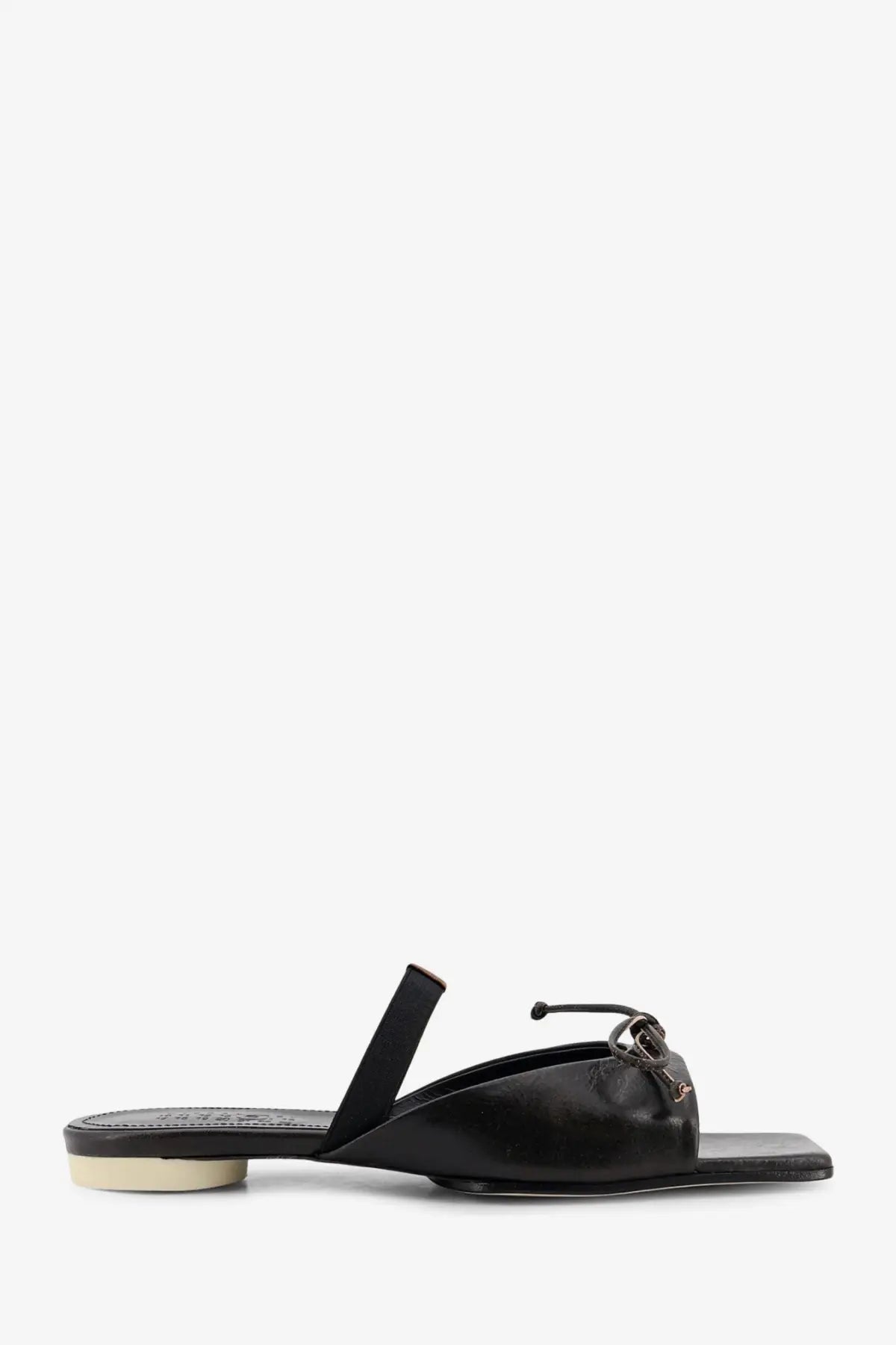 Black leather mule sandal with low block heel and decorative bow detail from mm6 maison margiela women’s leather sandals