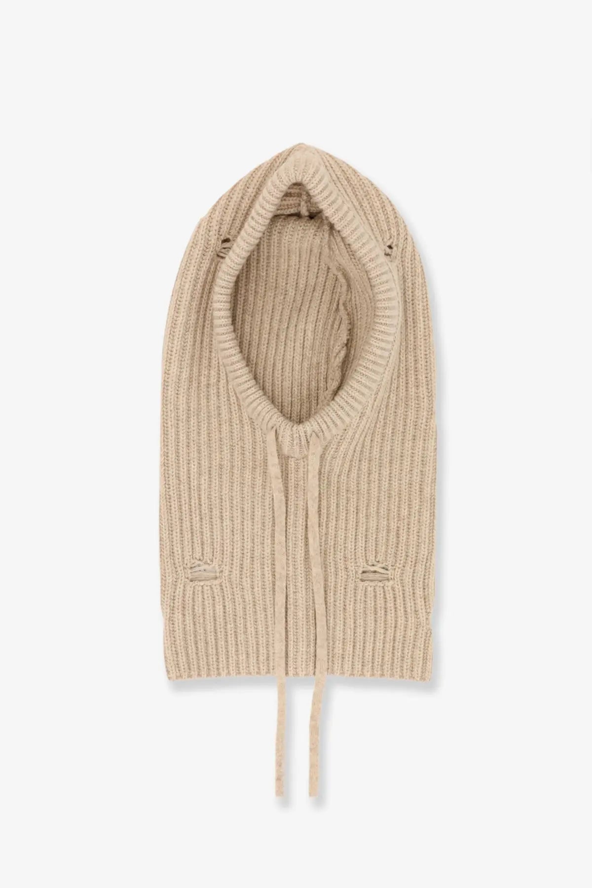 Beige wool blend ribbed knit balaclava with drawstring ties and distressed patch details by MM6 Maison Margiela