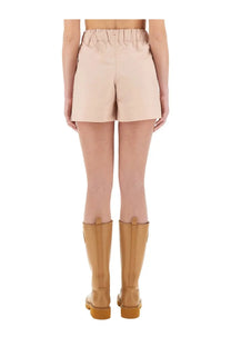 Beige high-waisted moncler grenoble women’s cotton gabardine shorts with gathered elastic waistband