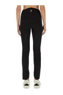 Black moncler grenoble women’s tailored trousers with sleek straight-leg cut and subtle logo at the waistband