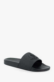 Black Moncler men’s Basile slide sandal with matte rubber sole and embossed logo on the strap
