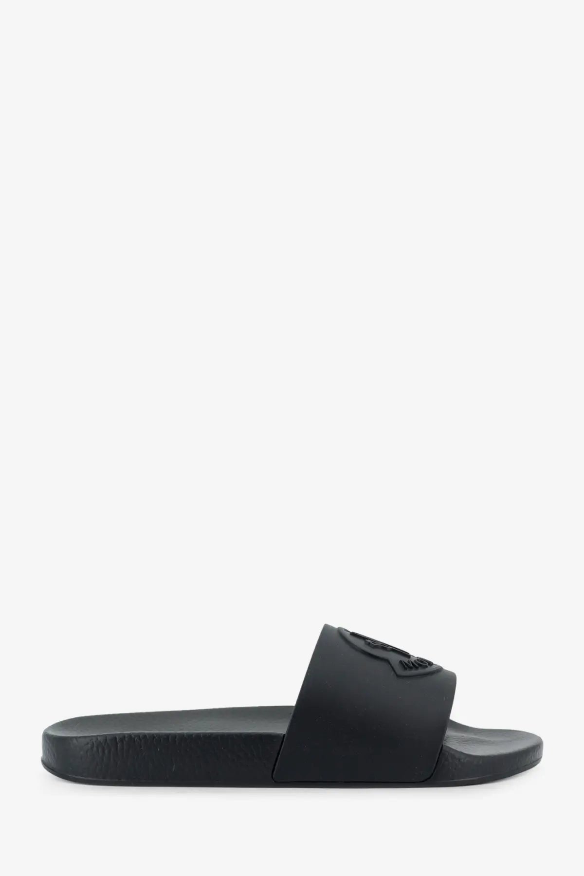 Black rubber Moncler men’s Basile slide sandal with minimalist design and embossed logo on the strap