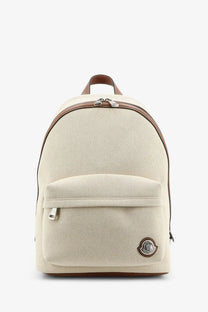 Moncler men’s Carlo canvas backpack white in beige with brown leather trim silver zippers and circular logo patch on front