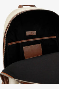 Beige and brown moncler mens carlo canvas backpack with textured exterior black interior lining and leather accents