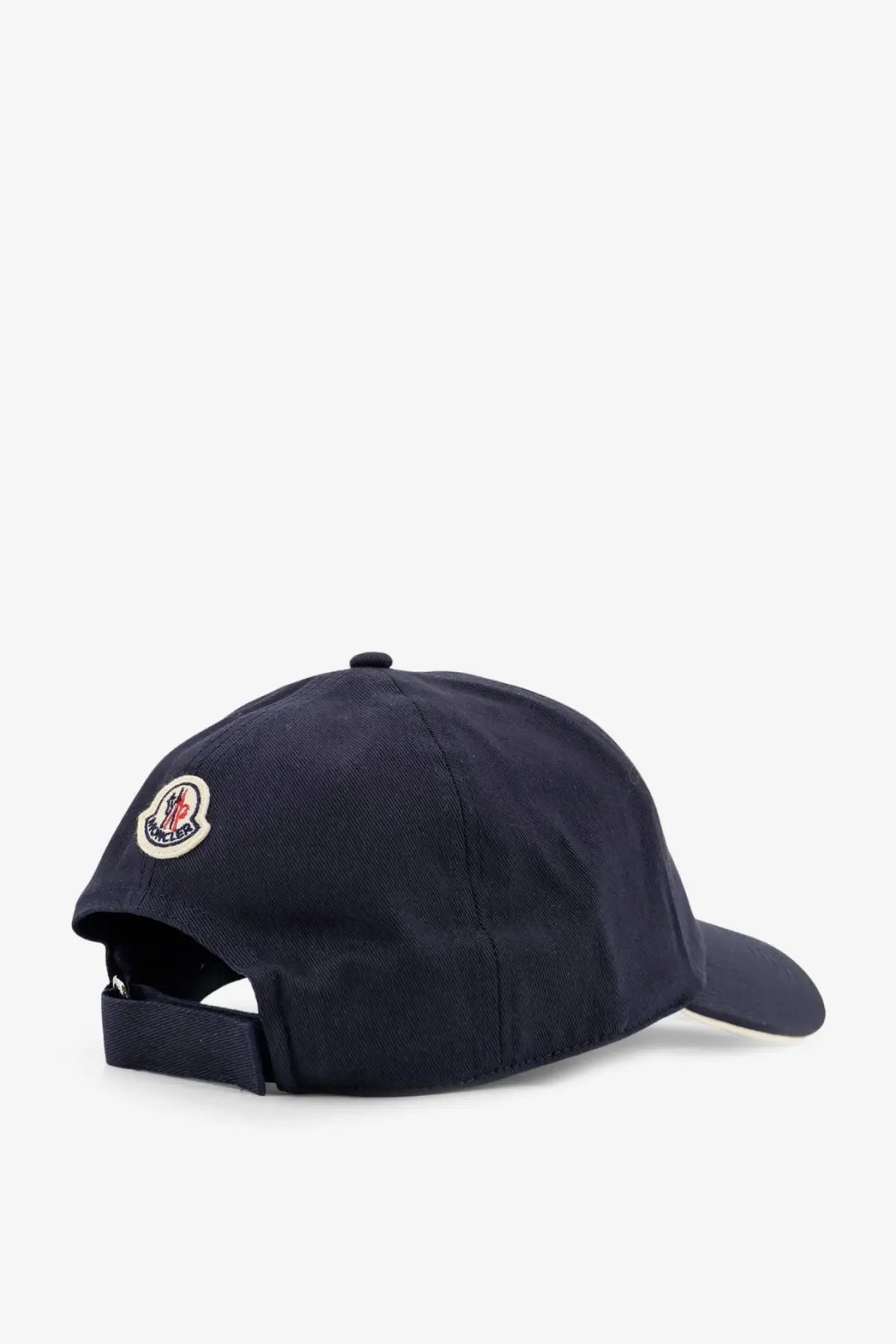 Navy blue Moncler men’s cotton baseball cap with circular embroidered logo on the side in grey product design