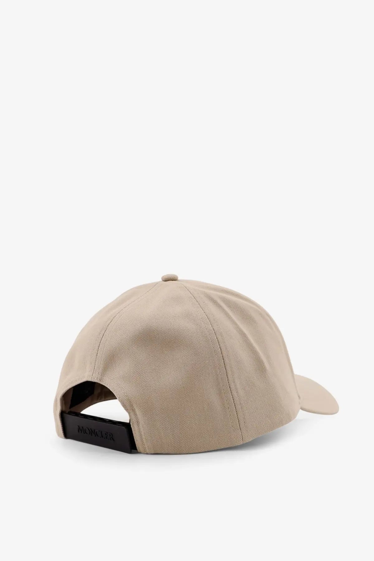 Beige cotton baseball cap with black adjustable strap and embroidered logo showing the back side by moncler men