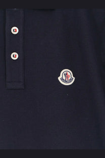 Moncler men’s cotton polo shirt in dark navy blue with white buttons and circular embroidered chest logo