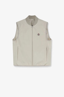 Beige Moncler men’s Hemmoor vest with ribbed collar, front zipper, and two side pockets in white