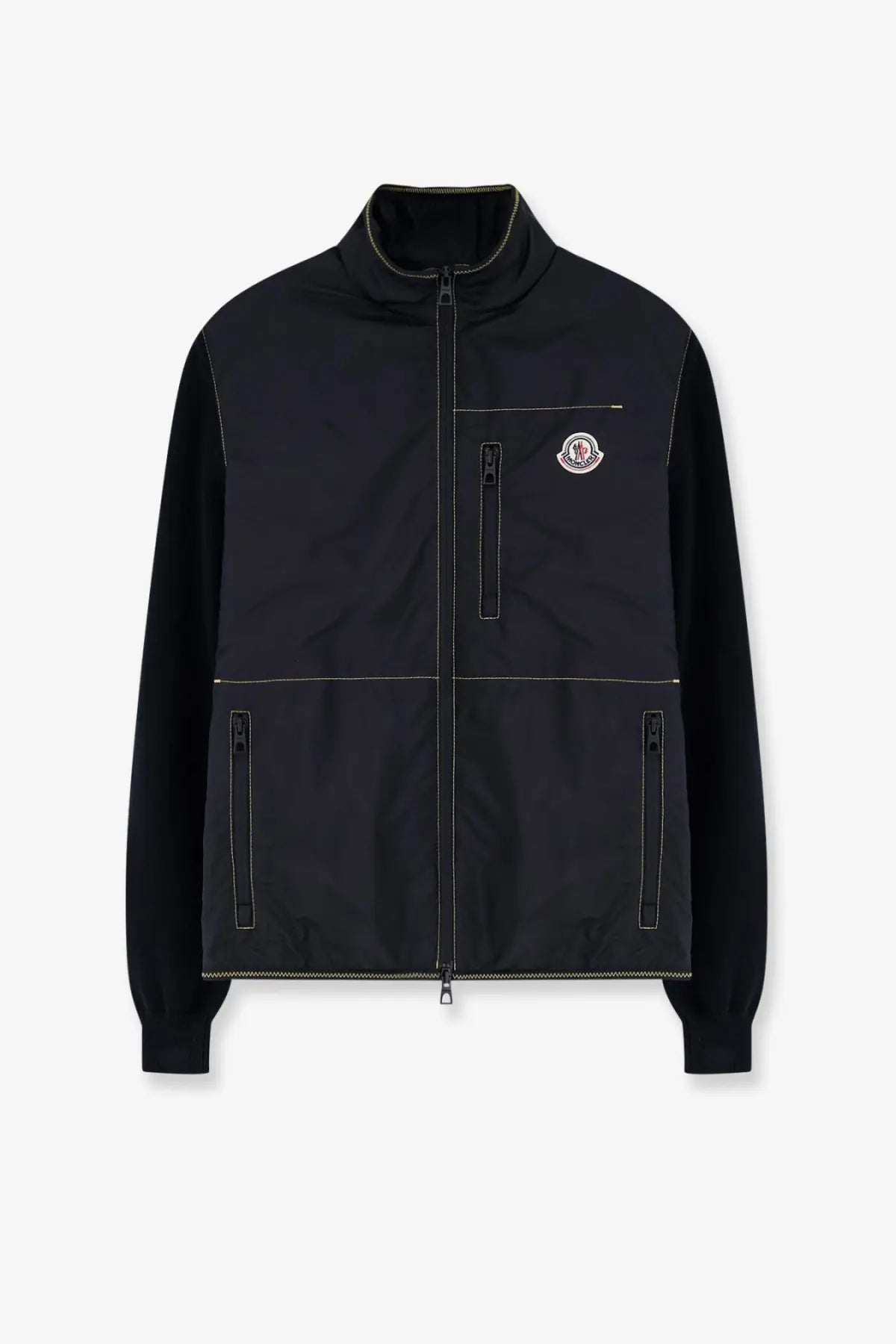 Moncler men’s black nylon jacket with contrasting white stitching and small embroidered logo on the chest