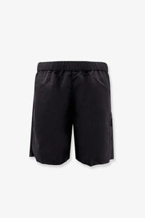 Moncler men’s black nylon swim trunks with elastic waistband and subtle side pocket for comfortable wear
