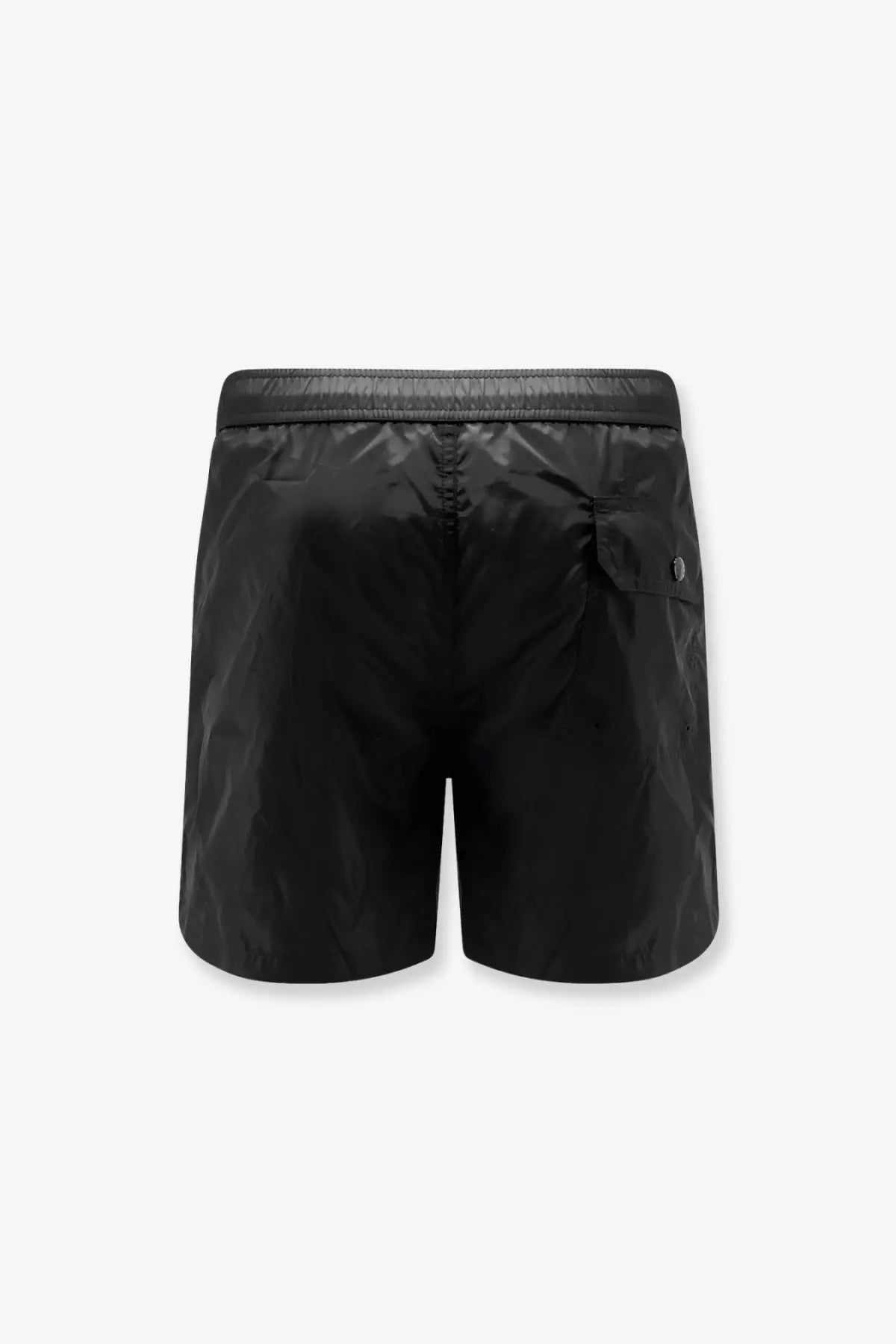 Moncler men’s black nylon swim trunks with a subtle sheen and a small logo on the side pocket