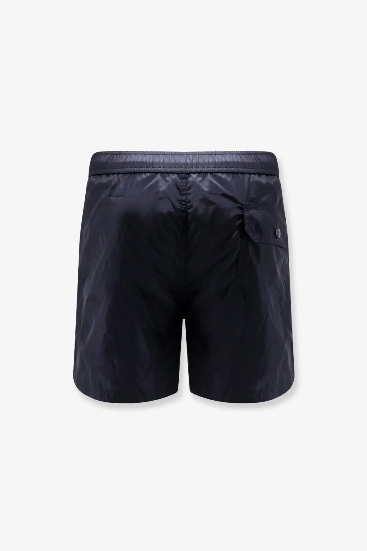 Moncler men’s swim trunks in black nylon with sleek lightweight fabric and subtle reflective stitching