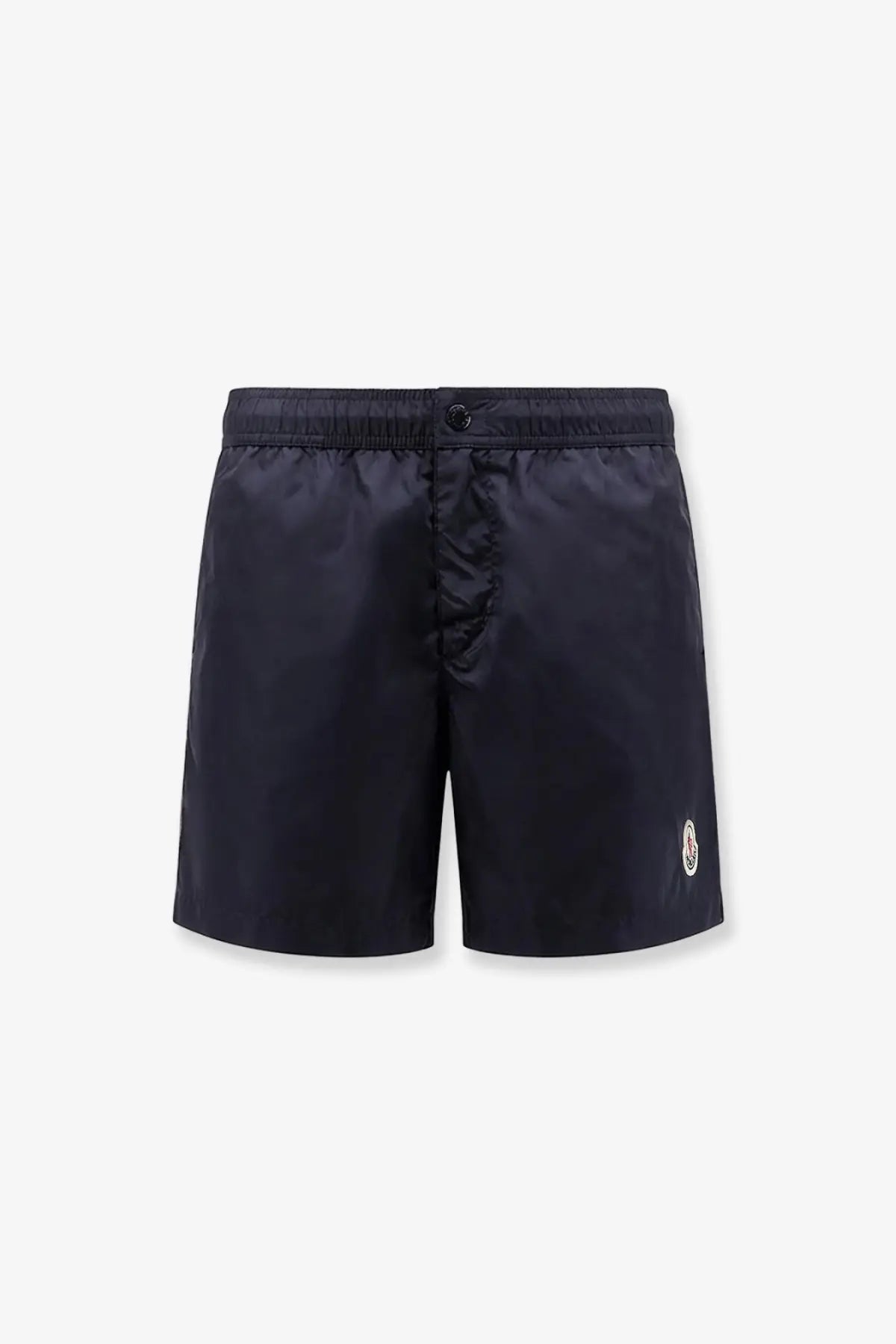 Moncler men’s dark navy nylon swim trunks with subtle logo on the lower right leg for swimming use