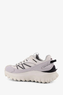 Moncler men’s trailgrip gtx leather and ripstop sneakers in white with light gray mesh upper and chunky black sole