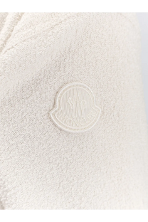 Cream-colored moncler logo patch embroidered on textured soft knit fabric of moncler women’s bouclé nylon jacket white