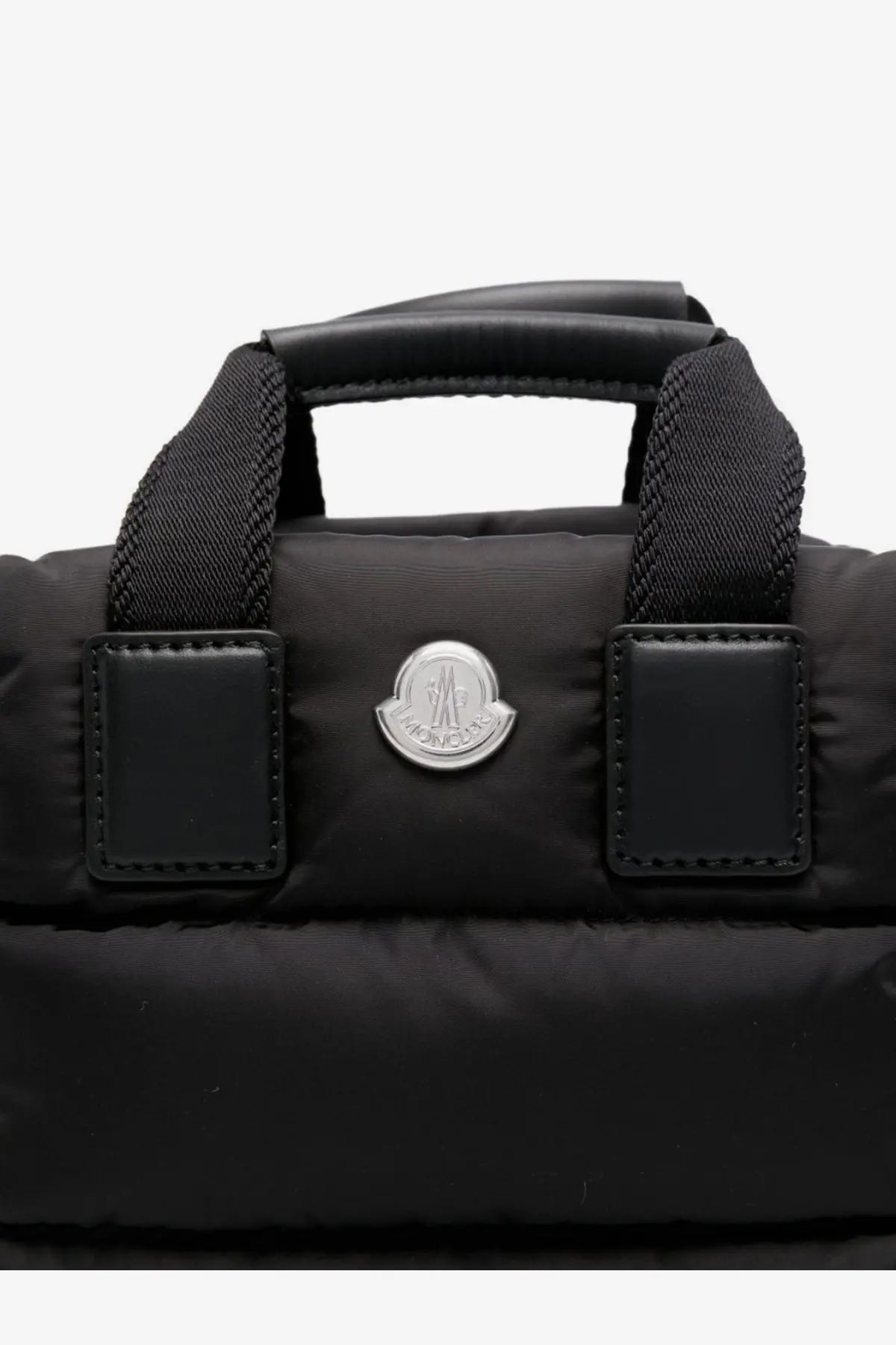 Moncler women’s Caradoc micro nylon shoulder bag in black with quilted puffer fabric leather patches and silver logo emblem
