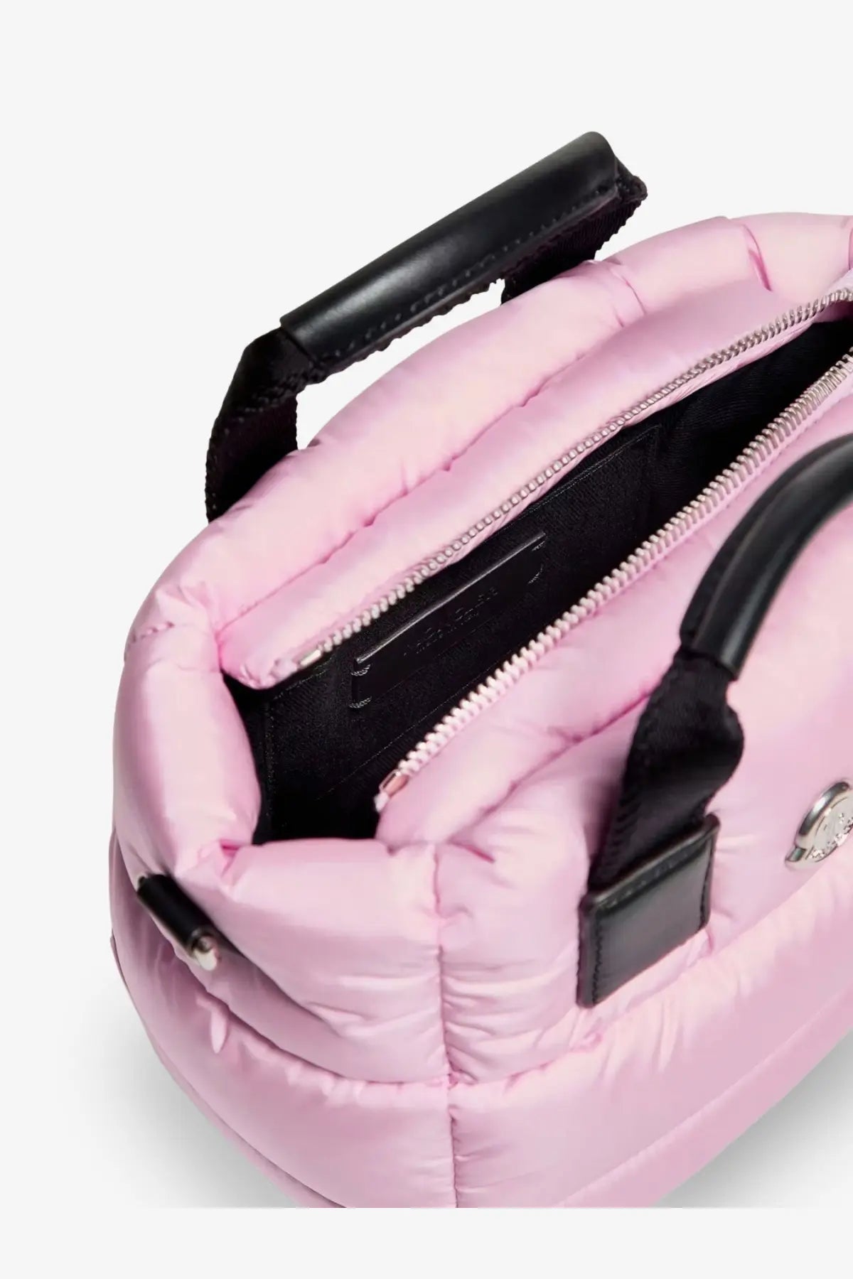 Moncler women’s caradoc micro nylon shoulder bag in pink with quilted design black leather handles and silver clasp