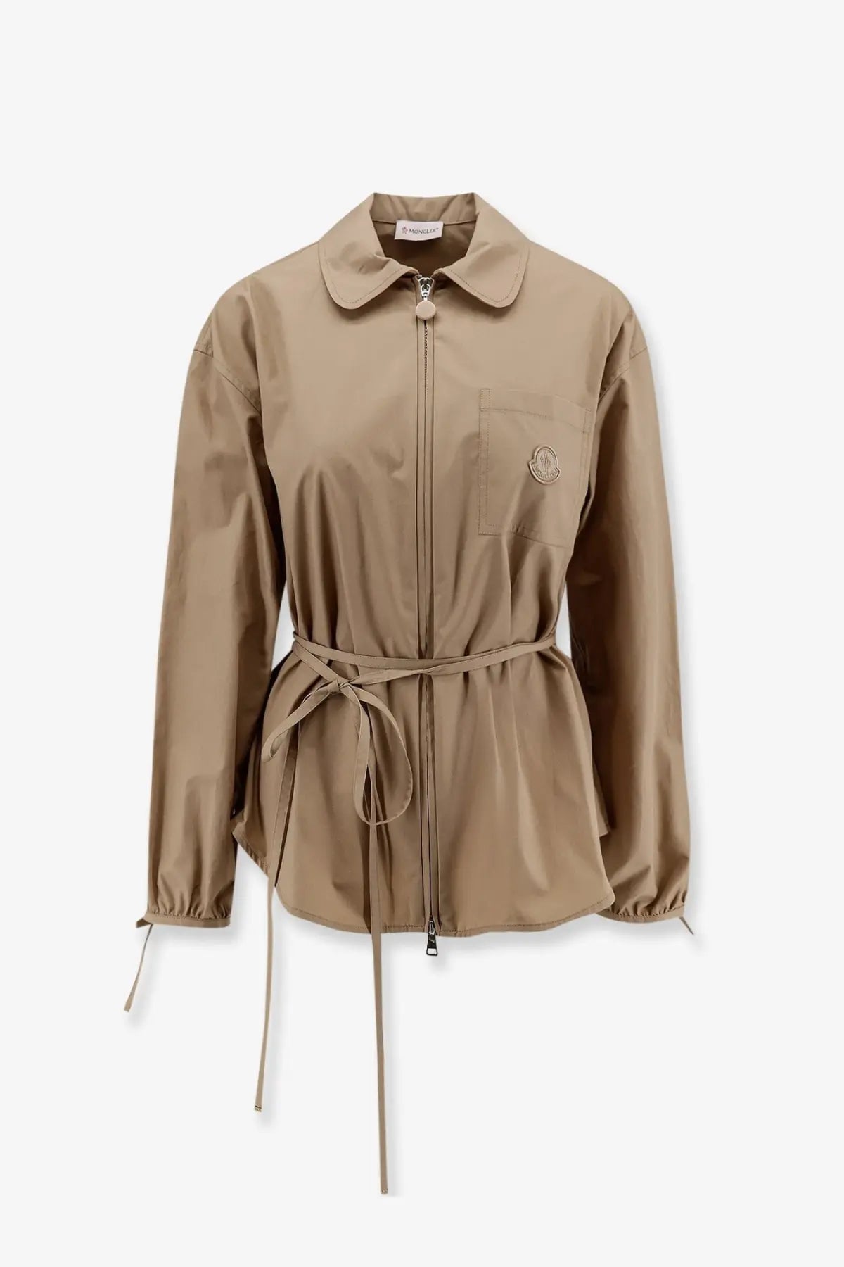 Beige moncler women’s cotton trench coat with collar front zipper and matching belt tied at the waist