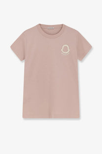 A soft blush pink moncler women’s cotton short-sleeved t-shirt with a subtle embroidered logo on the chest